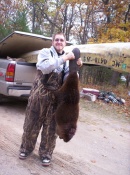 L.T. Miller with a 40 lb. beaver caught on the AuSable River in Oscoda, Michigan