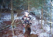 Troy Wortley's son, Cash, with one of the many coons he's caught