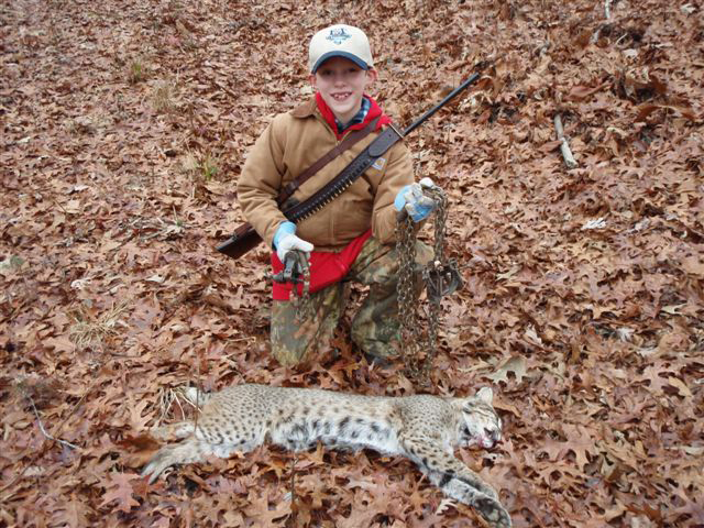 Will Maxwell with a fine Georgia bobcat caught with his dad, Brent