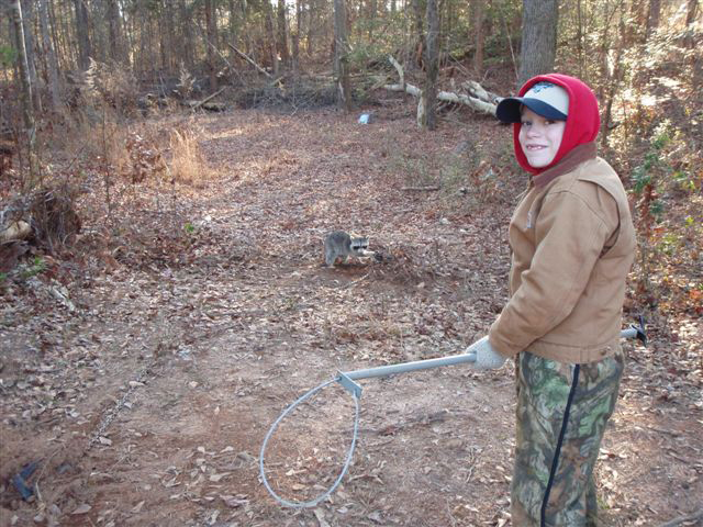 Will Maxwell with a Georgia raccoon