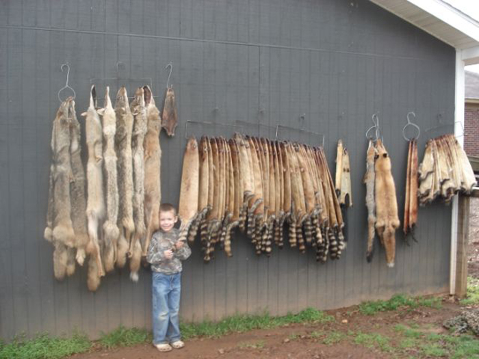 Jeff Prieboy's proud son with some of his dad's fur