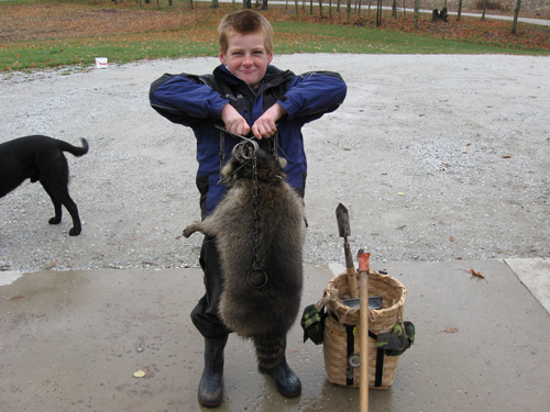 Michael Wolgamott with his first fully unassisted coon catch