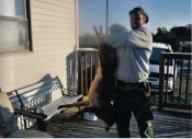 David Pullen of Owosso, Michigan with a nice trapped coyote