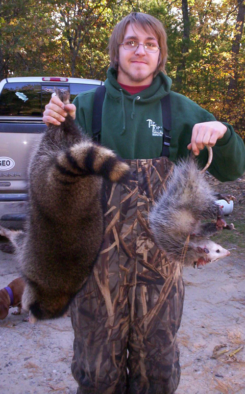 Lowell Miller with his first raccoon of the year
