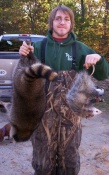 Lowell Miller with his first raccoon of the year