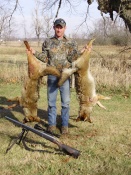 Tim Abrams with a fine pair of coyotes called in with a FoxPro FX3