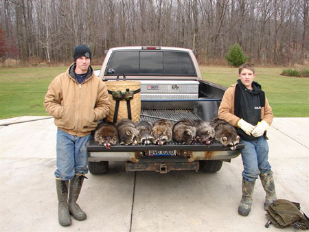 Justin and Jerad Fisher with a good catch of critters
