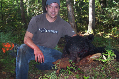 Michigan's Vance Gawel with a nice bear