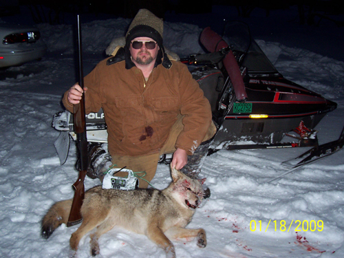 Don Sharboneau with coyote in hand just hours after receiving his FX3