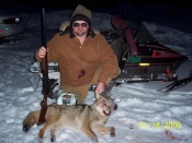Don Sharboneau with coyote in hand just hours after receiving his FX3