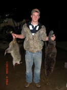 Levi holding a couple of rewards for his hard work