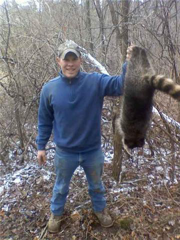 Ryan Aughenbaugh with a nice fat Pennsylvania coon.