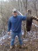 Ryan Aughenbaugh with a nice fat Pennsylvania coon.