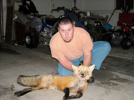 Utah's Curtis Ovard with his first trapped fox.