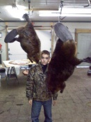 Hunter Brown with a 27 pound beaver and a 56 pound beaver