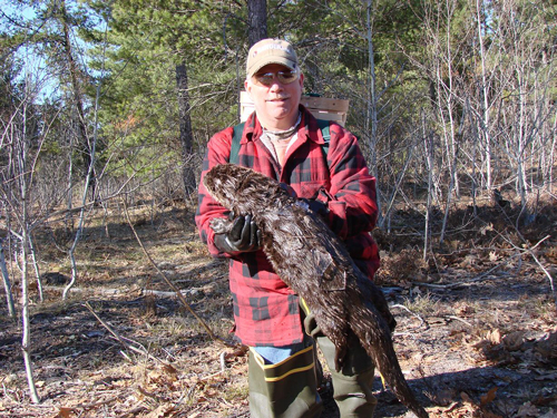 Mark Kinney with a great catch of an otter