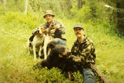Dan Greve and friend with a bear harvested by bow