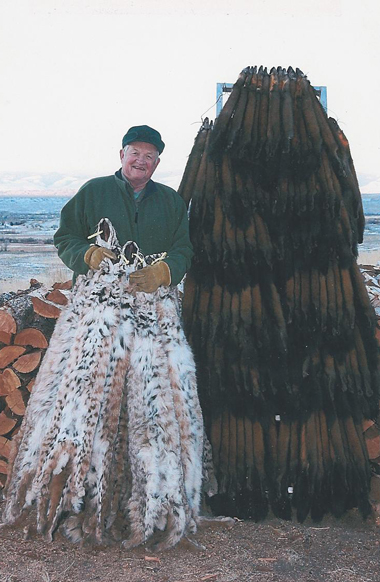 Tom Krause with a fantastic load of fur valued at over $17,000.