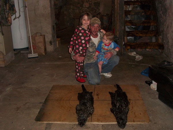 Mark Willis and daughters Sierra and Aubrey with a nice double on prime winter otter from the U.P. of Michigan