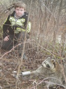 Owen Emery with his first coon with his dog proof traps his dad bought for his birthday