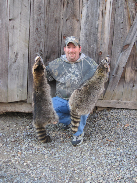 Troy Mackey from Horse Valley, PA with a couple of nice coons