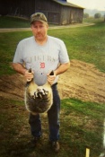 Rusty Hale holding a badger
