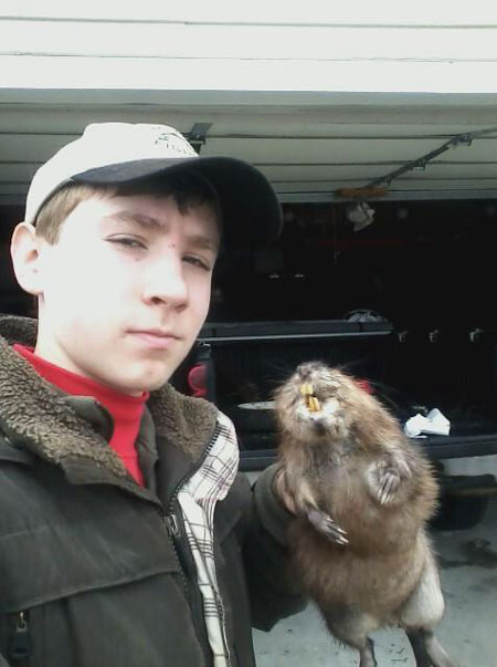 Jacob Komm from Michigan with his first muskrat