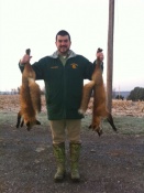 Troy Eppley from Pennsylvania with a couple of nice red fox