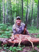 Predator hunter, Skye Goode, with a Central Wisconsin coyote