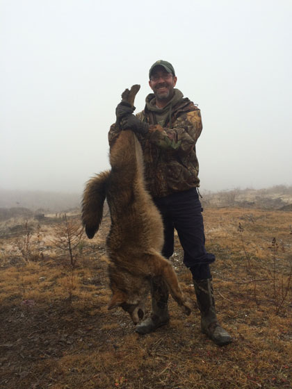 Michael Gerrin from Maine with a nice big coyote.