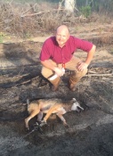 Matthew Wooten from Ariton, Alabama with a trapped coyote.