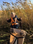 Future trapper in the making Matt Lawrence's son, Dylan, helping dad check his traps