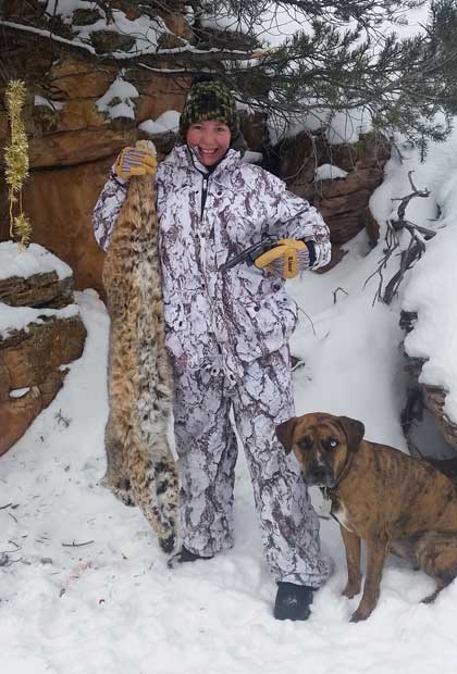 Michaela Sheridan with her first trapped bobcat