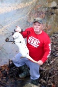 Kevin Carter of Crump, TN with an otter caught in small field drainage on a beaver crossover