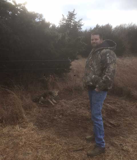 Johnny Duffy posing with a nice coyote