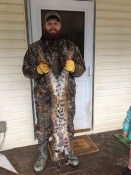 Tyler Mixer with a 23 pound bobcat caught in a cubby set in West Virginia 