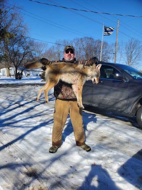 Jon Randle from Battle Ground, IN with his first trapped coyote