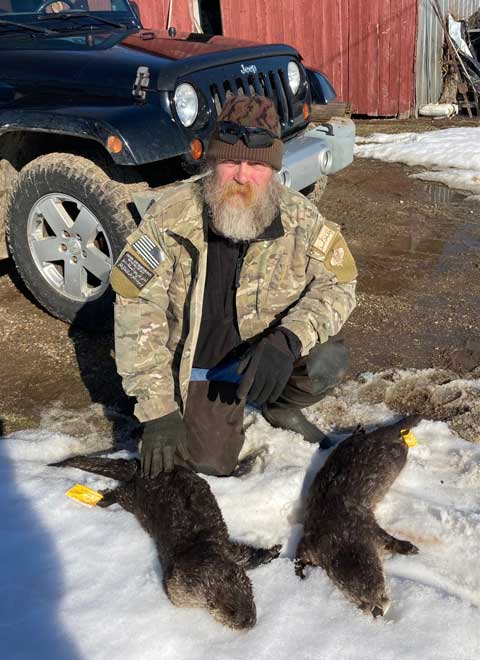 James LeMay from Dewitt, MI with a couple of otter.