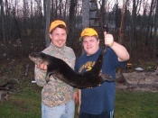 Troy and Ty Wortley with their first otter