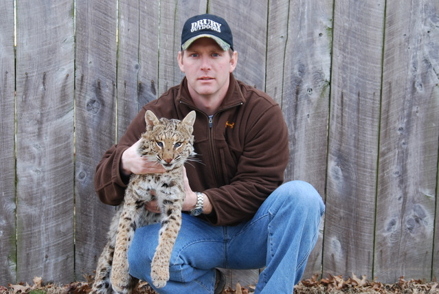 Corey Knochel with a Kentucky snared bobcat