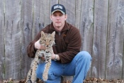 Corey Knochel with a Kentucky snared bobcat