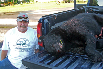 George Gerard with a Michigan bear that dressed out at 505 pounds