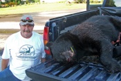 George Gerard with a Michigan bear that dressed out at 505 pounds