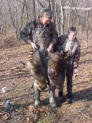 Missouri's Frankie and Treavor Kimes with a nice coon and beaver